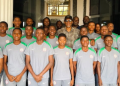 NFF acting General Secretary Emmanuel Ikpeme with Nigeria's Falconets and Flamingos