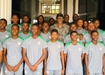 NFF acting General Secretary Emmanuel Ikpeme with Nigeria's Falconets and Flamingos