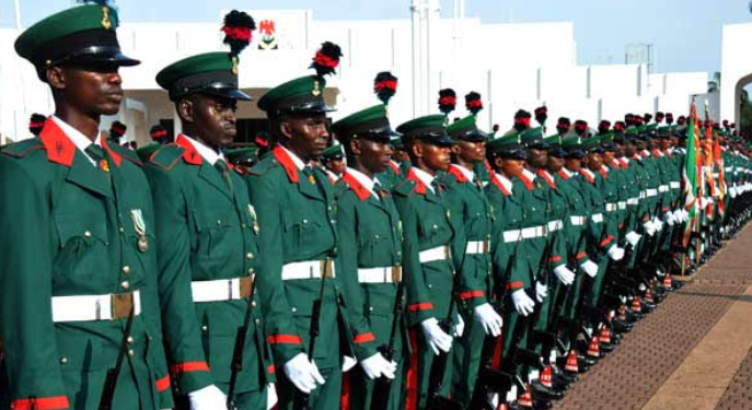 Troops of the Guards Brigade of the Nigerian Army rescue the wife of retired Brig.-Gen. Basil Adonkie hours after she is abducted from her Abuja residence