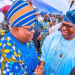 Osun State Governor Ademola Adeleke shakes hands with Bola Oyebamiji during a public event, as Oyebamiji’s legal team denies authorizing a petition challenging Adeleke’s victory in the August 15 governorship election.