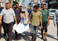 Palestinians carry the body of three-year-old Saadi Ghalia, who was killed by an Israeli tank shell