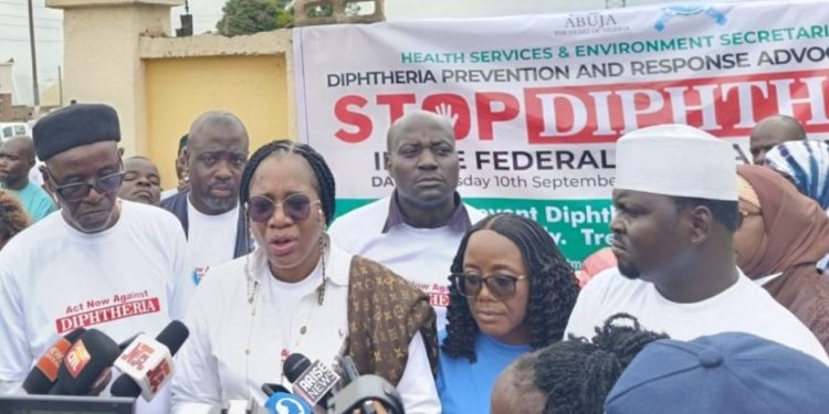 FCTA Mandate Secretary, Dr Adedolapo Fasawe takes sensitisation again diphtheria to Karshi Community