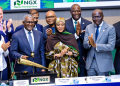 Senior officials and business leaders pose at the Nigerian Exchange, NGX, trading floor during the opening of the Dangote Refinery IPO