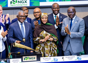 Senior officials and business leaders pose at the Nigerian Exchange, NGX, trading floor during the opening of the Dangote Refinery IPO