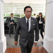 Thailand’s Foreign Minister Sihasak Phuangketkeow arrives for a meeting with his Cambodian counterpart Prak Sokhonn in Singapore as both countries begin UN-backed talks to resolve their long-running maritime boundary dispute.