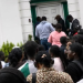 Nigerians gather at a passport intervention centre in the UK