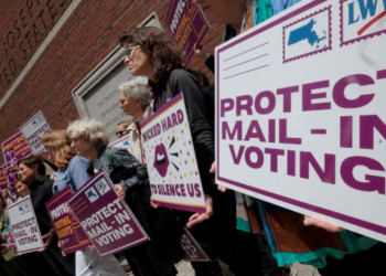 Supporters gather outside a federal courthouse in Boston, Massachusetts, during a legal challenge to President Donald Trump’s executive order tightening rules on mail-in voting.