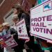 Supporters gather outside a federal courthouse in Boston, Massachusetts, during a legal challenge to President Donald Trump’s executive order tightening rules on mail-in voting.