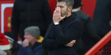 Manchester United head coach Michael Carrick reacts during his side's 3-0 Premier League loss to Bournemouth at Old Trafford on Sunday.( photo credit: AFP)