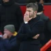 Manchester United head coach Michael Carrick reacts during his side's 3-0 Premier League loss to Bournemouth at Old Trafford on Sunday.( photo credit: AFP)