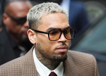 Chris Brown arrives at Southwark Crown Court for sentencing over an attack on music producer Abraham Diaw at a London nightclub.