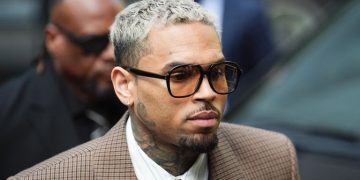 Chris Brown arrives at Southwark Crown Court for sentencing over an attack on music producer Abraham Diaw at a London nightclub.