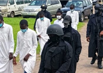Five suspects accused of kidnapping prospective NYSC members and other victims arrive in court under DSS escort.( Photo credit: The Cable)