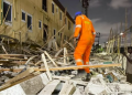 LASEMA pulled three men alive from rubble after a two‑storey building collapsed in Lagos; one fatality confirmed as search operations continue.