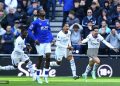 Chelsea forward Pedro Neto celebrates with his teammates on the pitch after scoring a goal.( Photo Credit AFP )