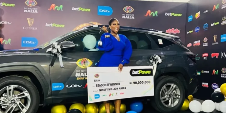 BBNaija Season 11 winner Temi Nkem receives her N90 million cash prize and brand-new SUV at the official prize presentation.