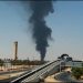 A plume of dark smoke rises behind the terminal at King Khalid International Airport in Riyadh, Saudi Arabia. A plume of dark smoke rises behind the terminal at King Khalid International Airport in Riyadh, Saudi Arabia.