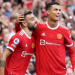Manchester United midfielder Bruno Fernandes alongside Cristiano Ronaldo during a team match, as Fernandes backs the veteran forward amid uncertainty over his international future.
