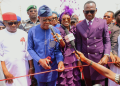 Minister Wike, Dr. Paul Enenche, Pastor Becky Enenche at the commissioning of the newly built Dunamis pedestrian bridge