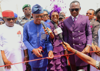 Minister Wike, Dr. Paul Enenche, Pastor Becky Enenche at the commissioning of the newly built Dunamis pedestrian bridge
